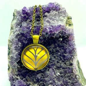 Bronze and gold color glass pendant